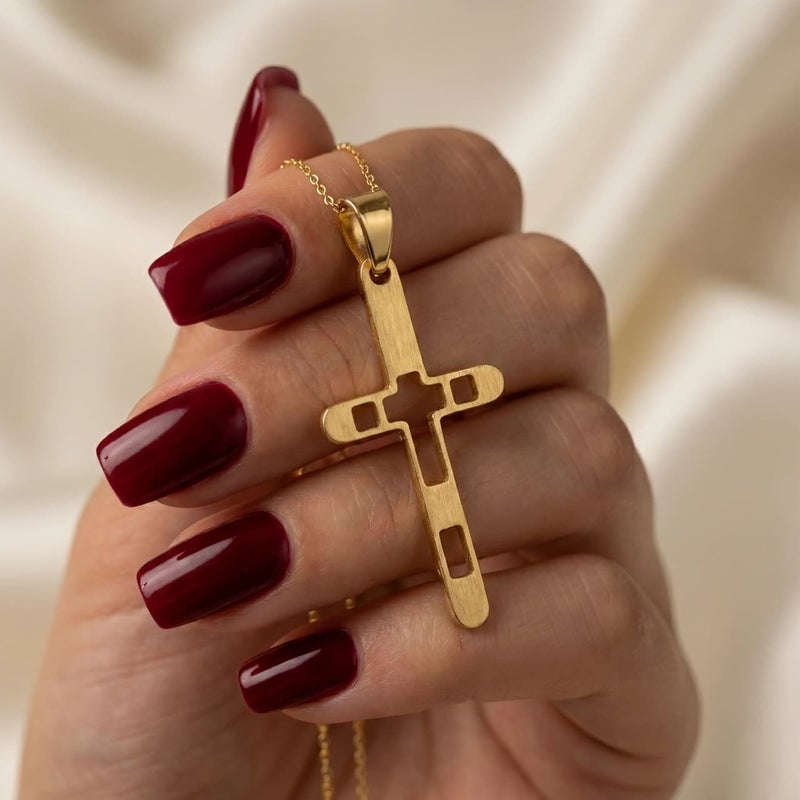A large gold-tone cross pendant (chain not included), crafted from rust-resistant stainless steel, featuring an elegant openwork design. A modern accessory that adds a touch of distinction and spirituality to your look. - Image 3